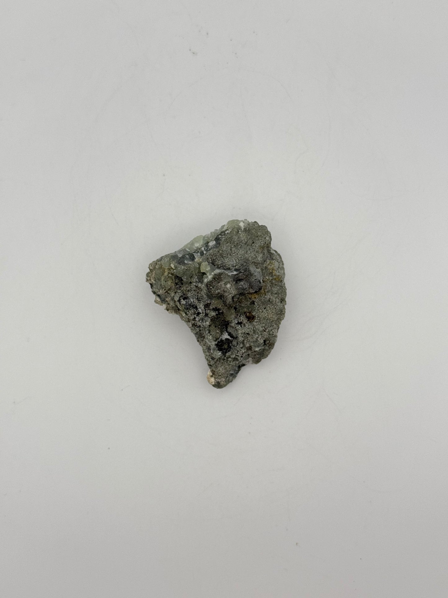 Raw prehnite specimen with amazing green color.