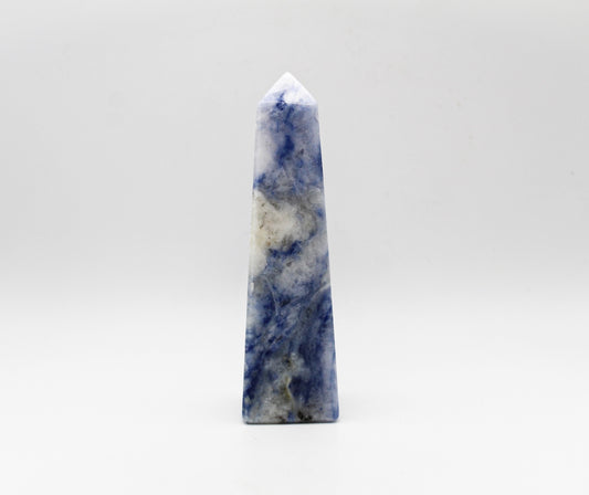 Afghanite four sided tower. Height of 4 3/4 inches, width of 1 1/4 inches.