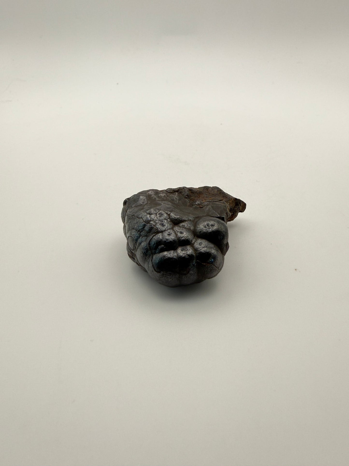 Small raw hematite specimen.