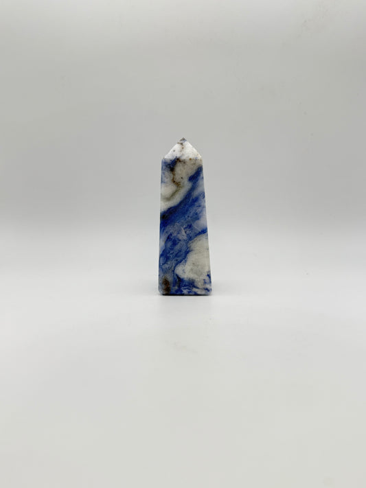 Afghanite four sided tower. Height of 3 1/4 inches, width of 1 1/4 inches.