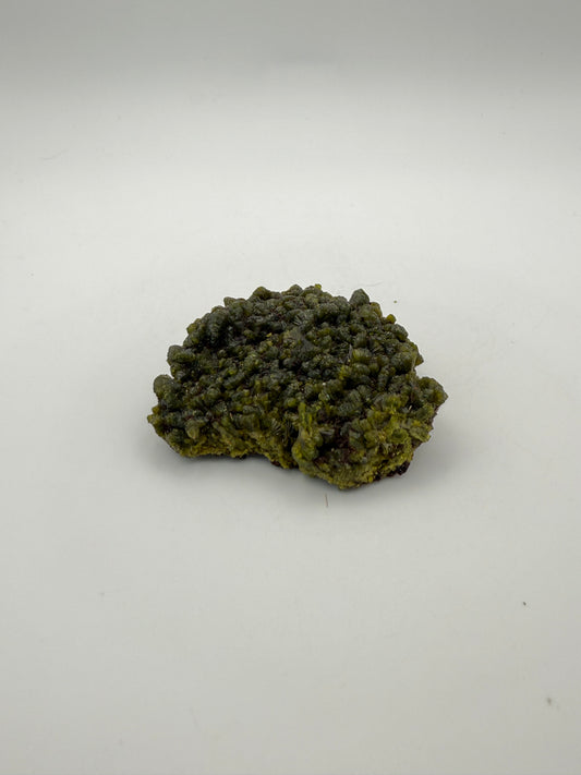 Epidote crystal cluster with good green color.