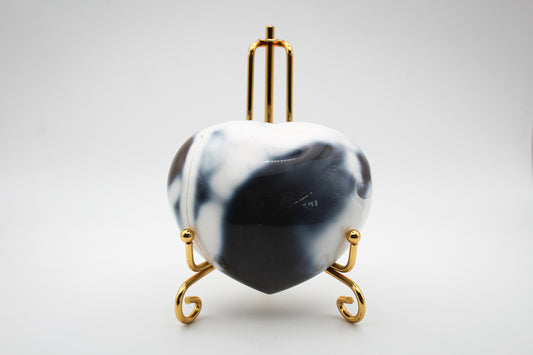 Polished orca agate heart.