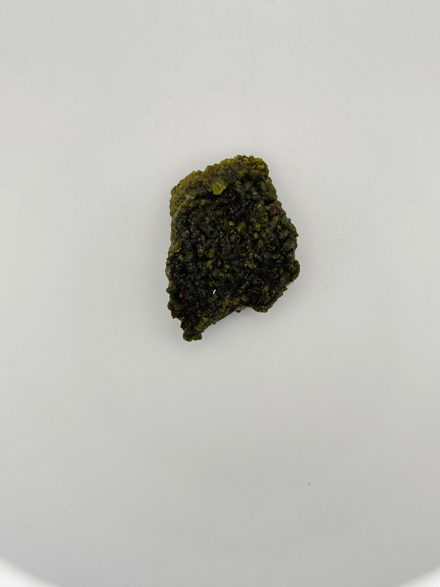Epidote crystal cluster with good green color.