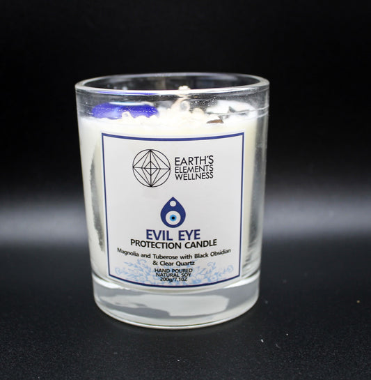 Evil eye candle with scents of magnolia and Tuberose.