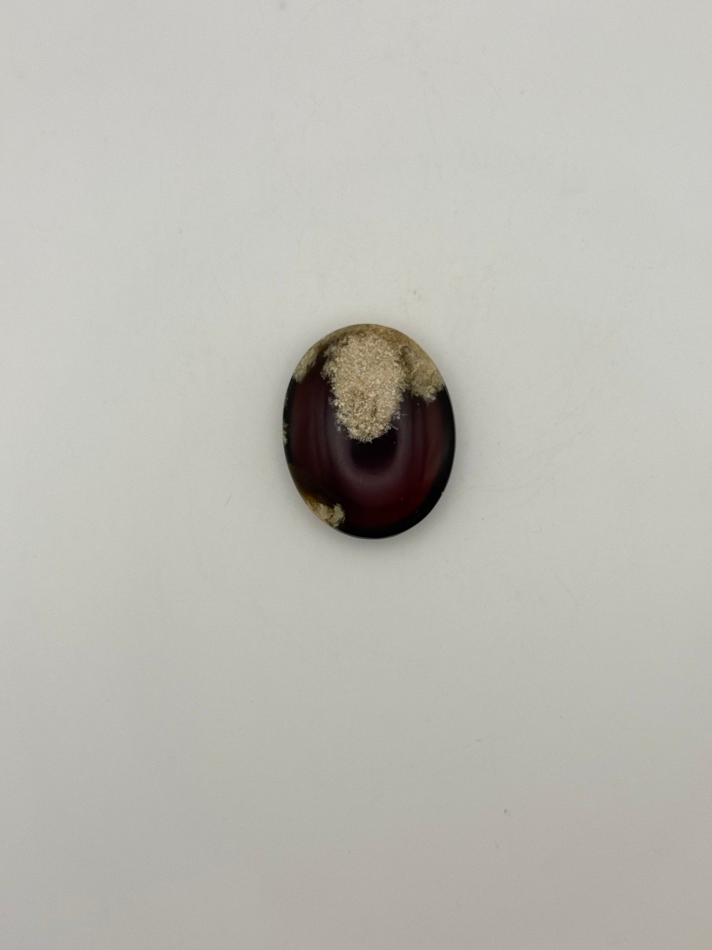 Amber shaped into an oval