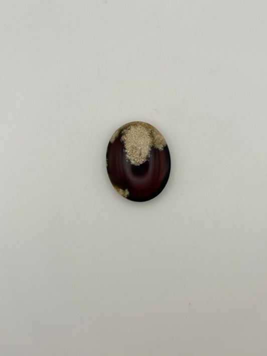 Amber shaped into an oval