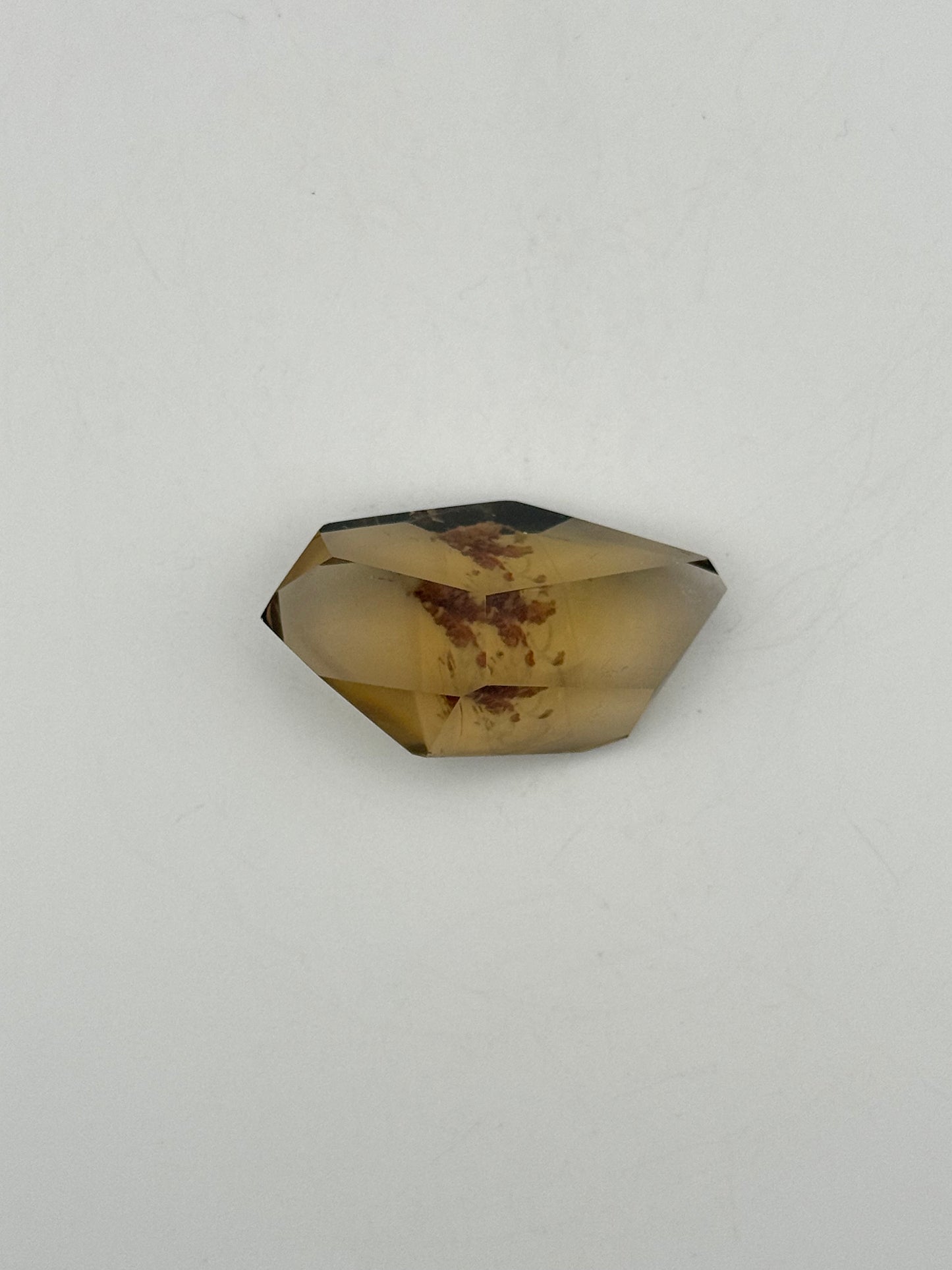 Polished natural citrine point.
