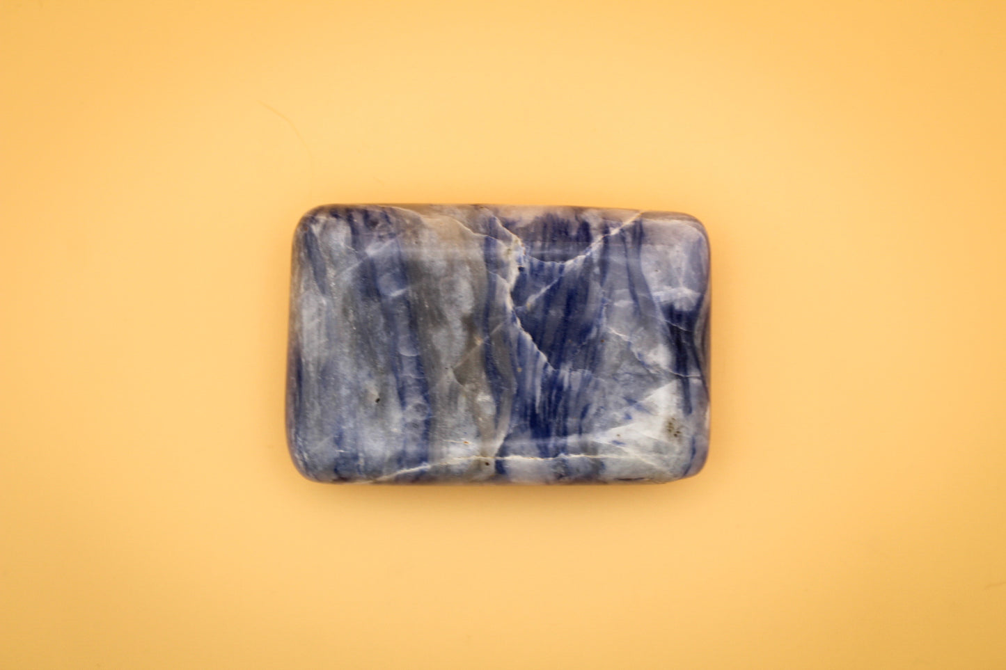Rectangle soap-shaped afghanite polished crystal.