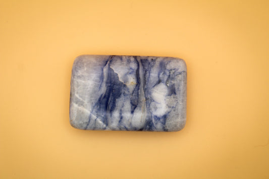 Rectangle soap-shaped afghanite polished crystal.