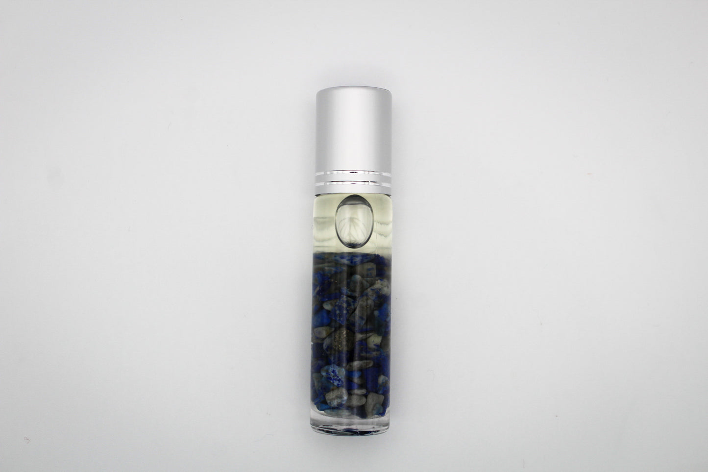 Roll on bottle with essential oils and an intention of meditation.