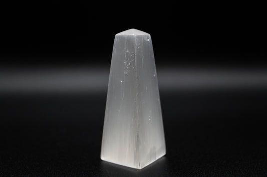 Selenite tower that is 6cm tall.