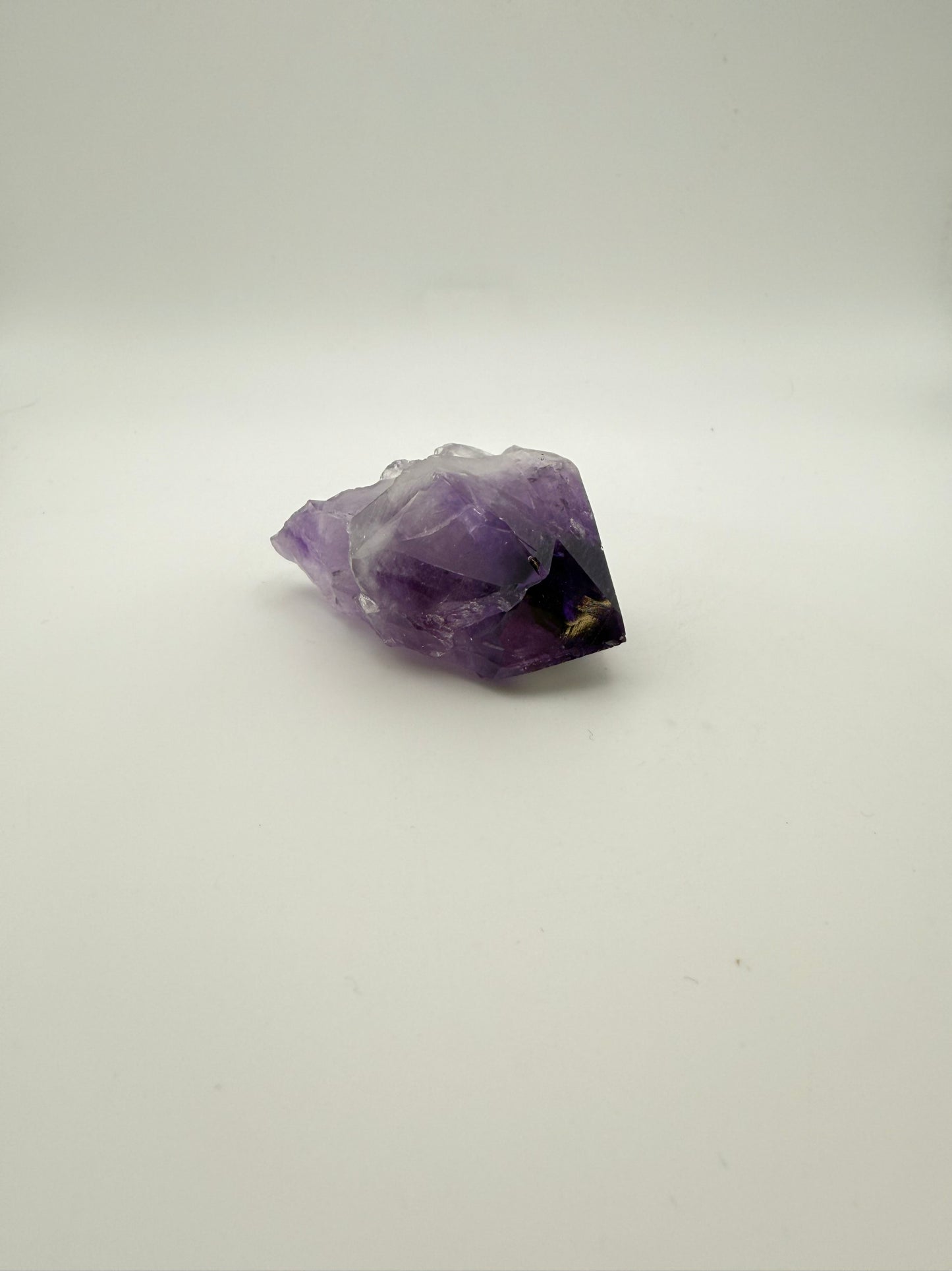 Amethyst crystal with deep purple color.
