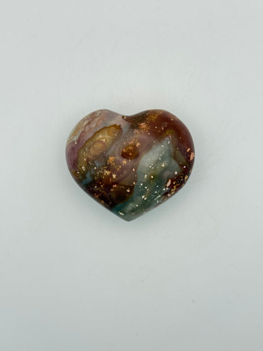A polished polychrome jasper free from.