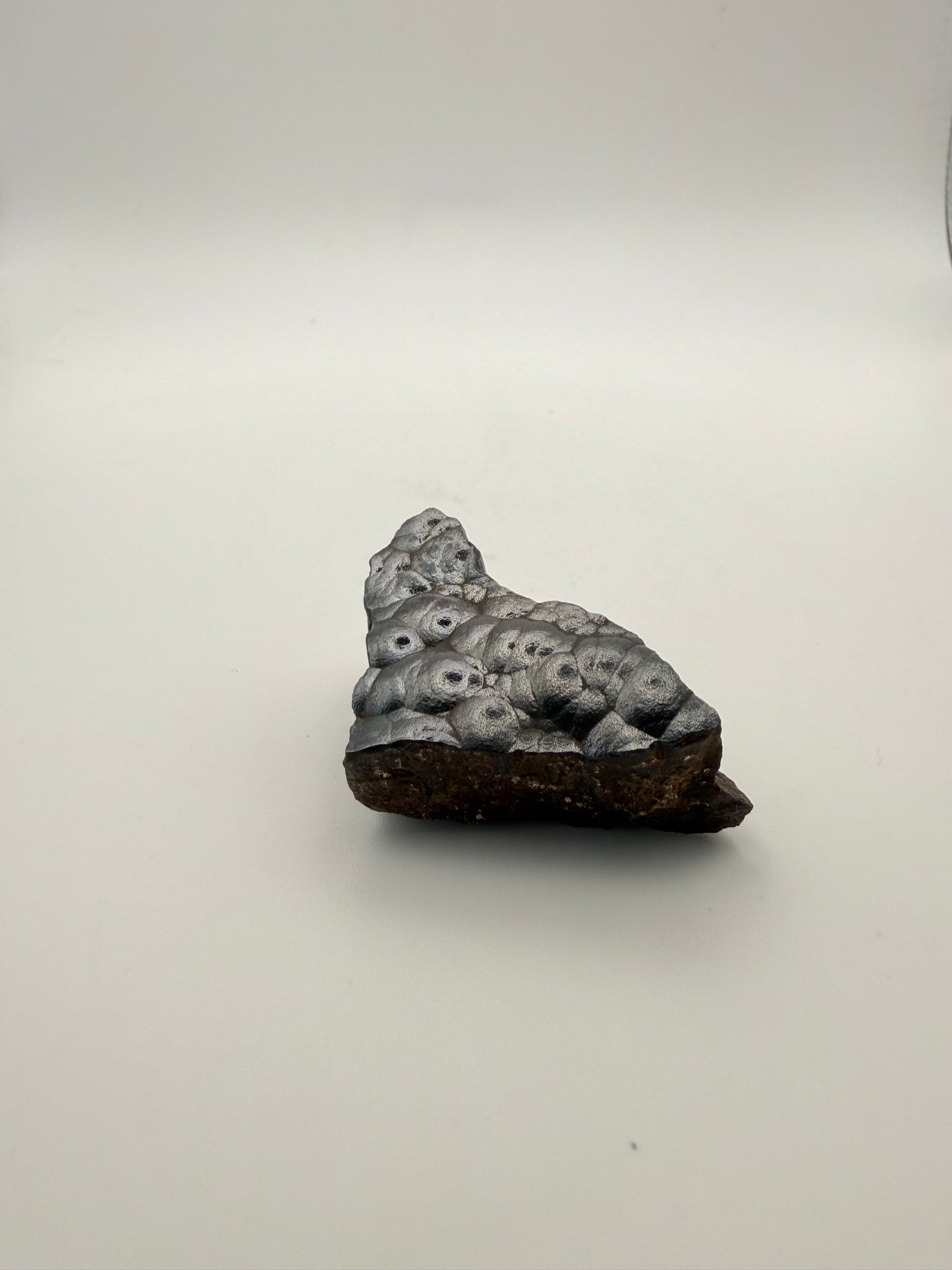 Small raw hematite specimen.