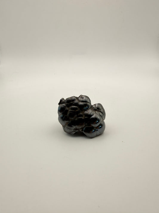 Small raw hematite specimen.