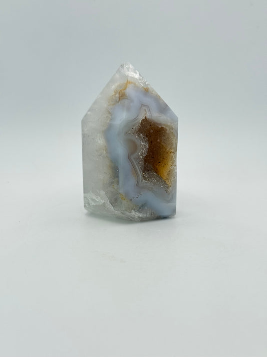Polished druzy agate tower.