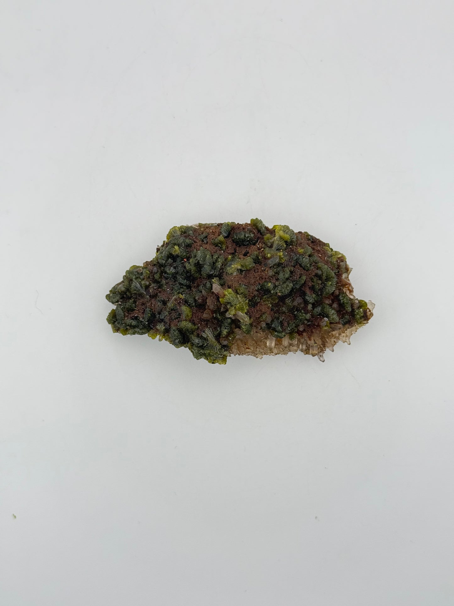 Epidote crystal cluster with good green color.