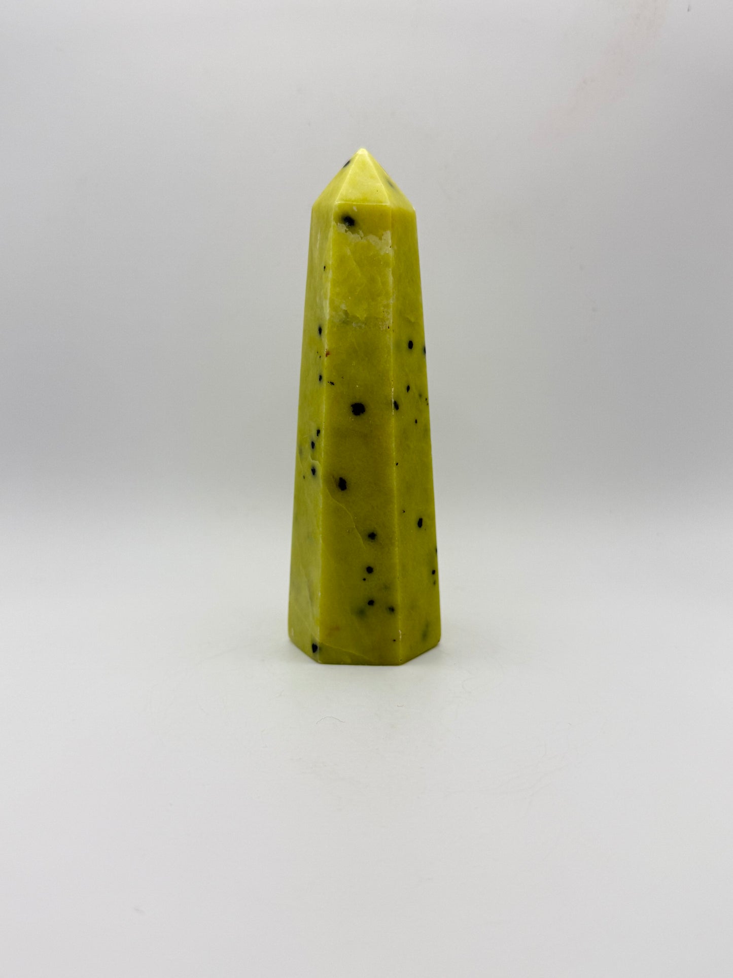 Polished healerite six sided tower.