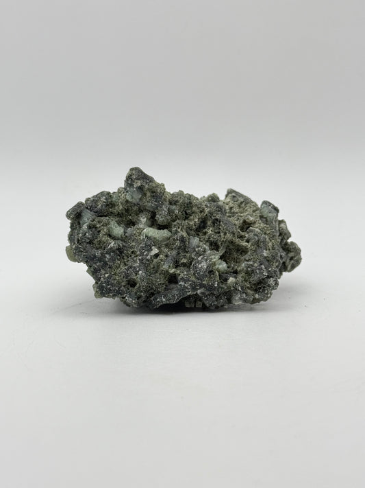 Raw prehnite specimen with amazing green color.