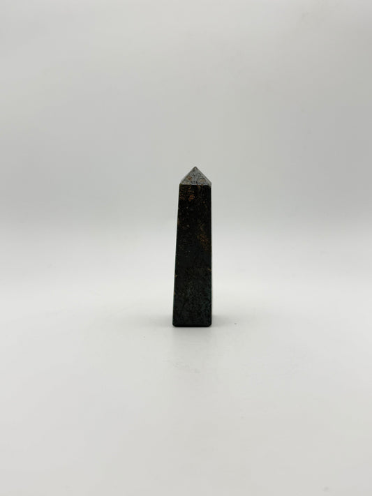 four sided hematite tower.