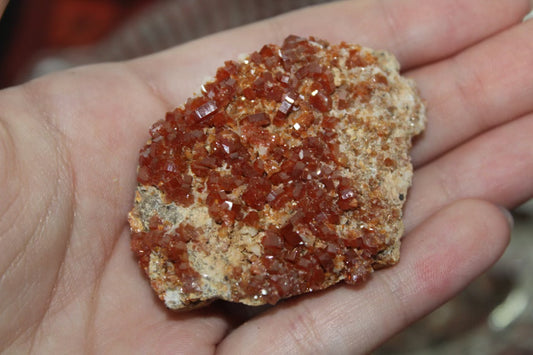 Vanadinite specimen with amazing sparkly red crystal formations.