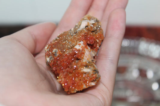 Vanadinite specimen with amazing sparkly red crystal formations.