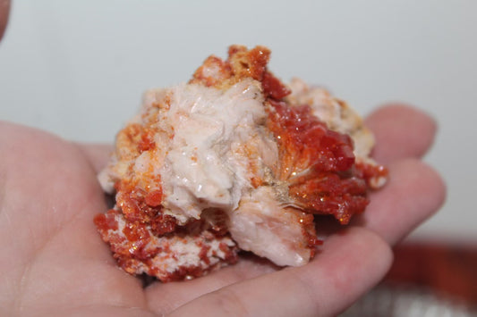 Vanadinite specimen with amazing sparkly red crystal formations.