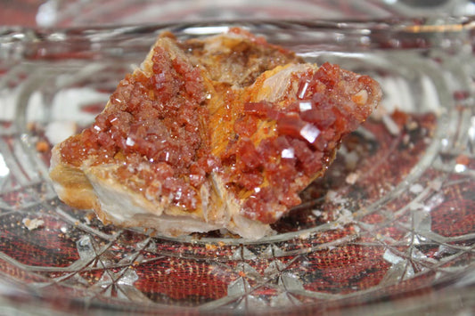 Vanadinite specimen with amazing sparkly red crystal formations.