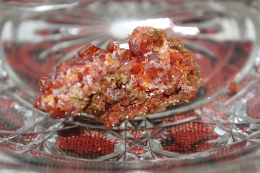 Vanadinite specimen with amazing sparkly red crystal formations.