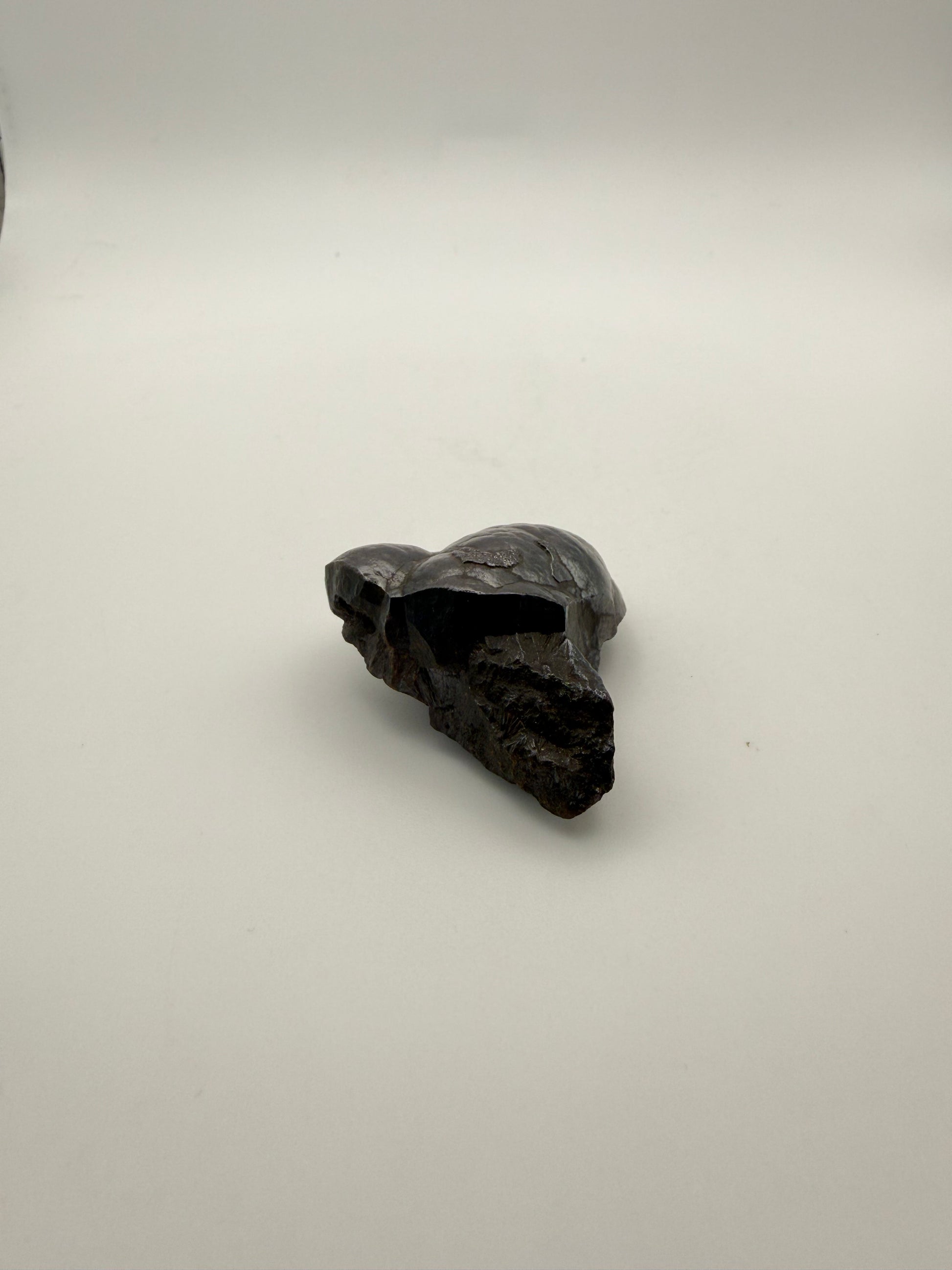 Small raw hematite specimen.