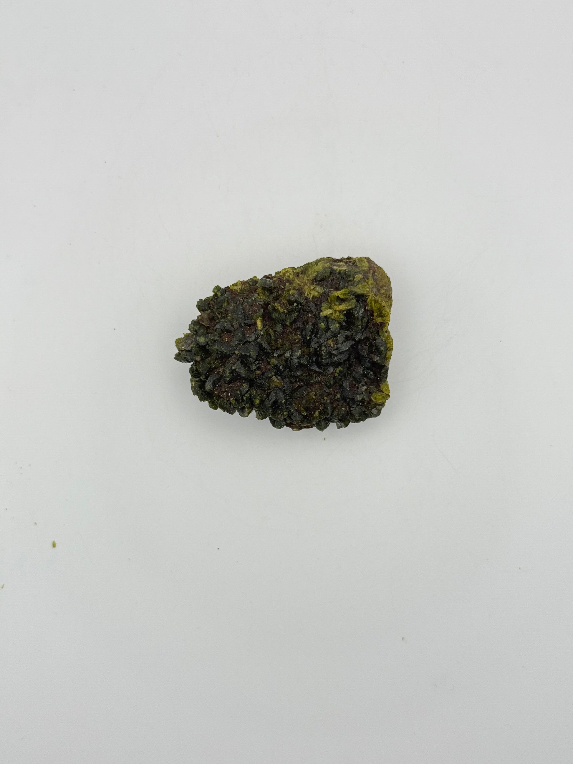 Epidote crystal cluster with good green color.