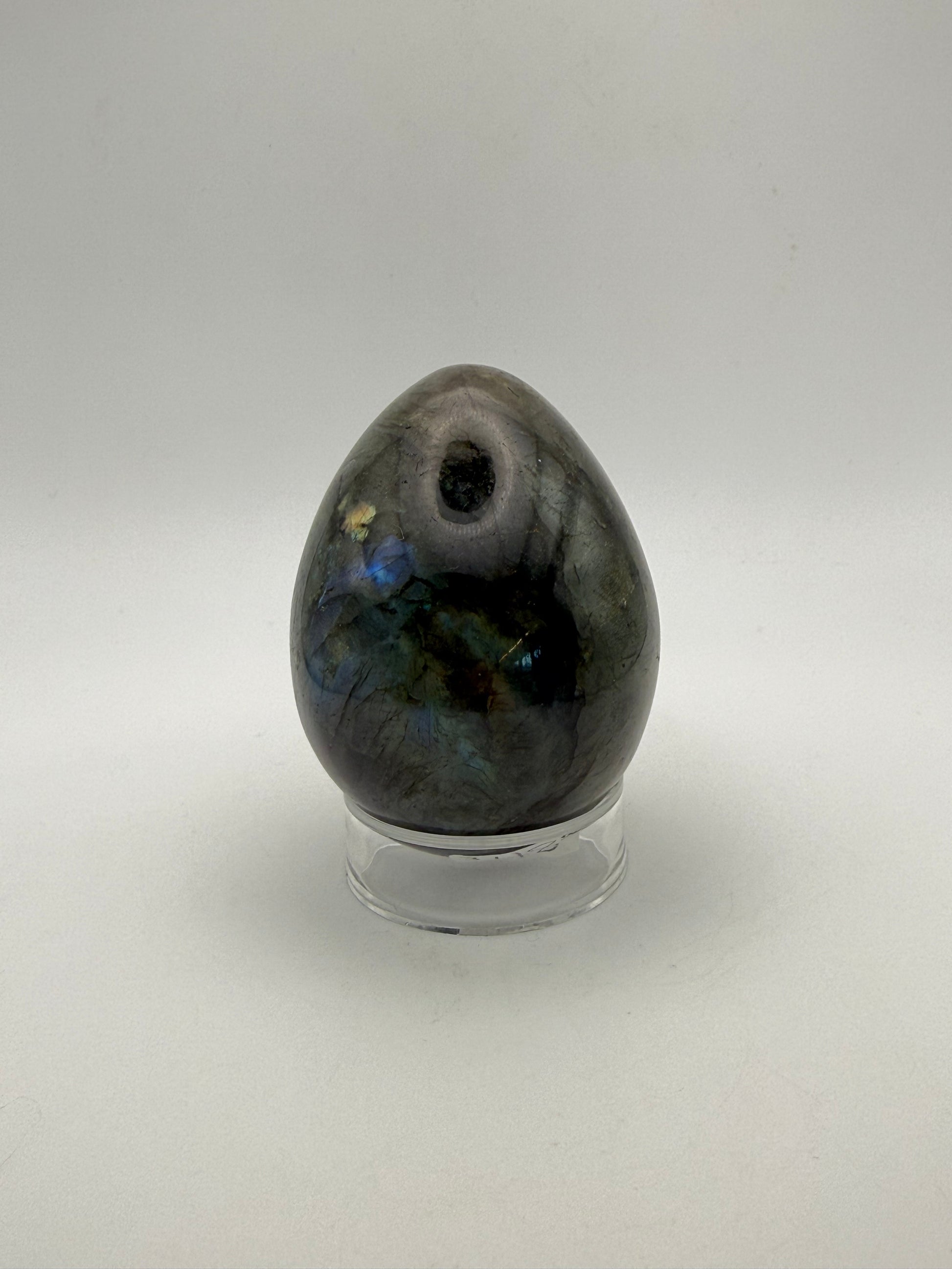 Labradorite polished stone in the shape of an egg.