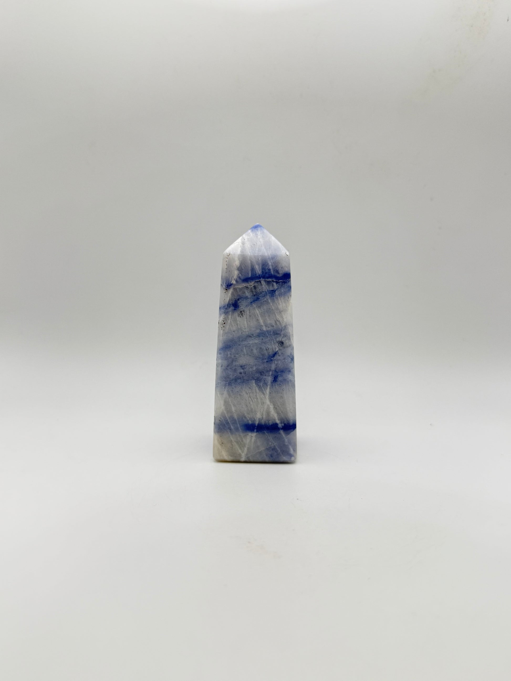 Afghanite four sided tower. Height of 3 1/2 inches, width of 1 1/4 inches.