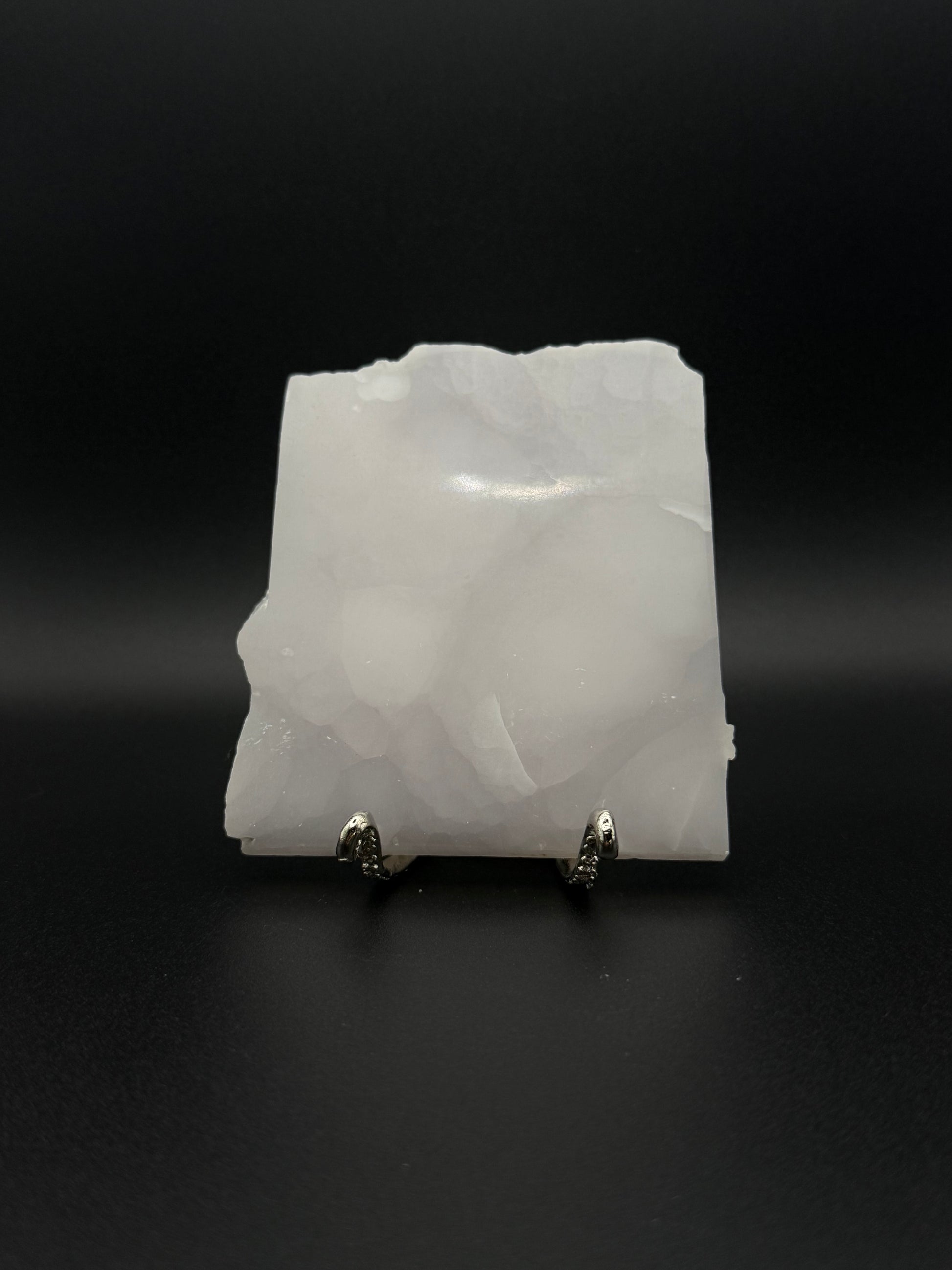 Polished pink calcite slab. Pink calcite glows under uv light.