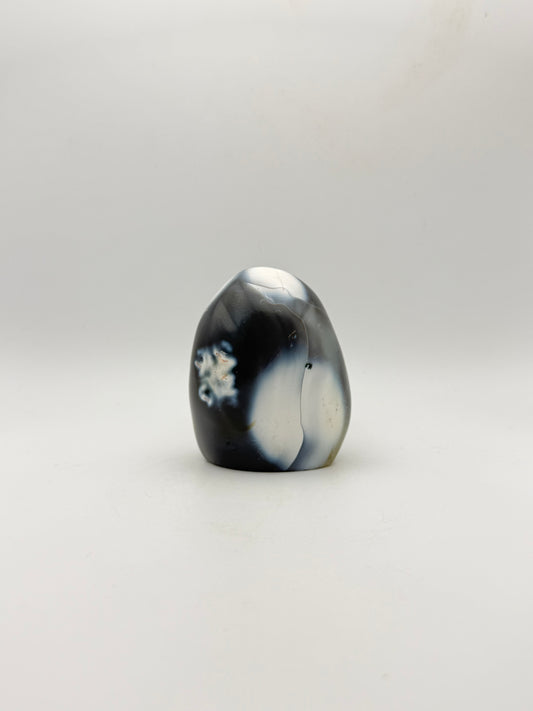 Polished orca agate free form.