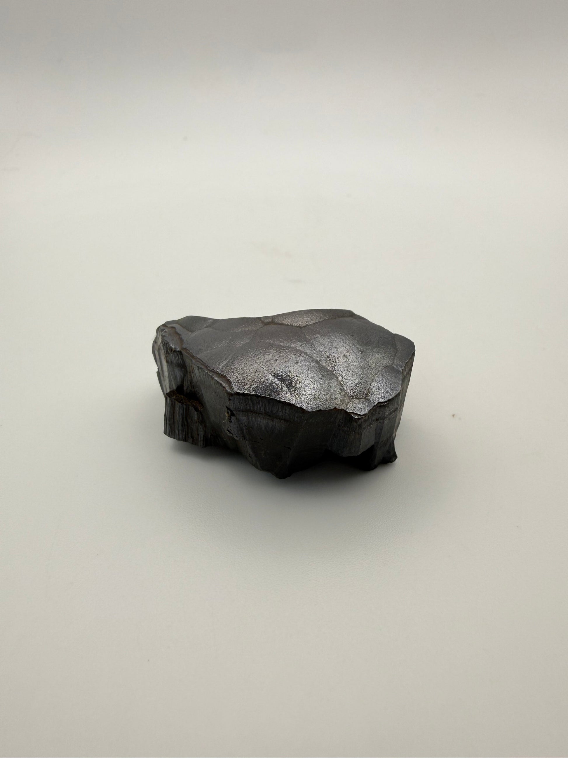 Small raw hematite specimen.