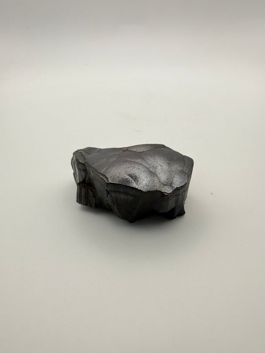 Small raw hematite specimen.