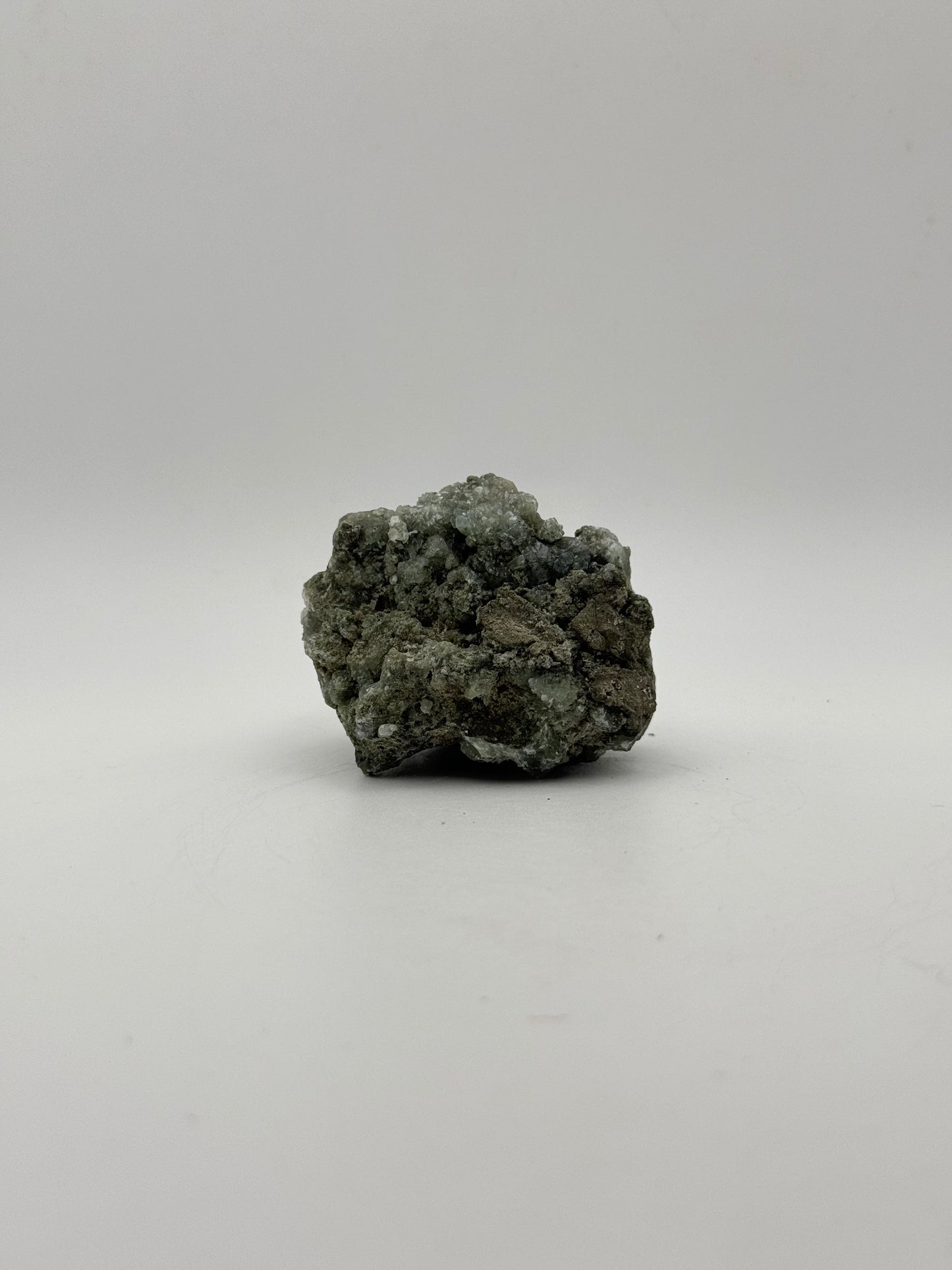 Raw prehnite specimen with amazing green color.