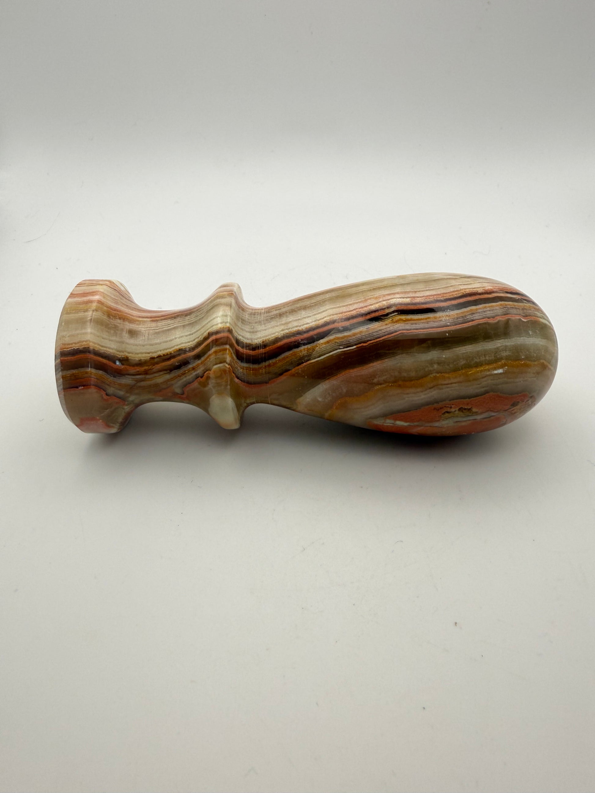 Mortar and pestle made out of onyx stone.