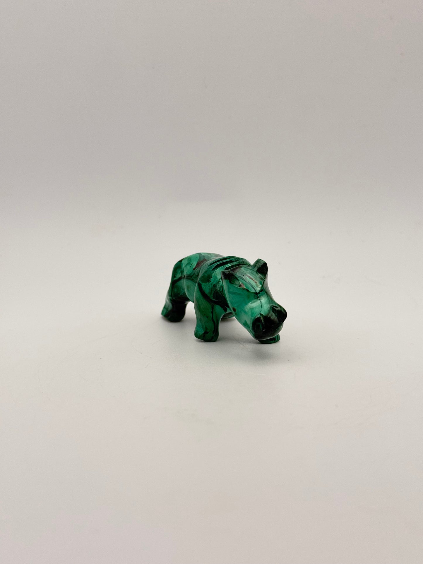 Malachite hippo carving.