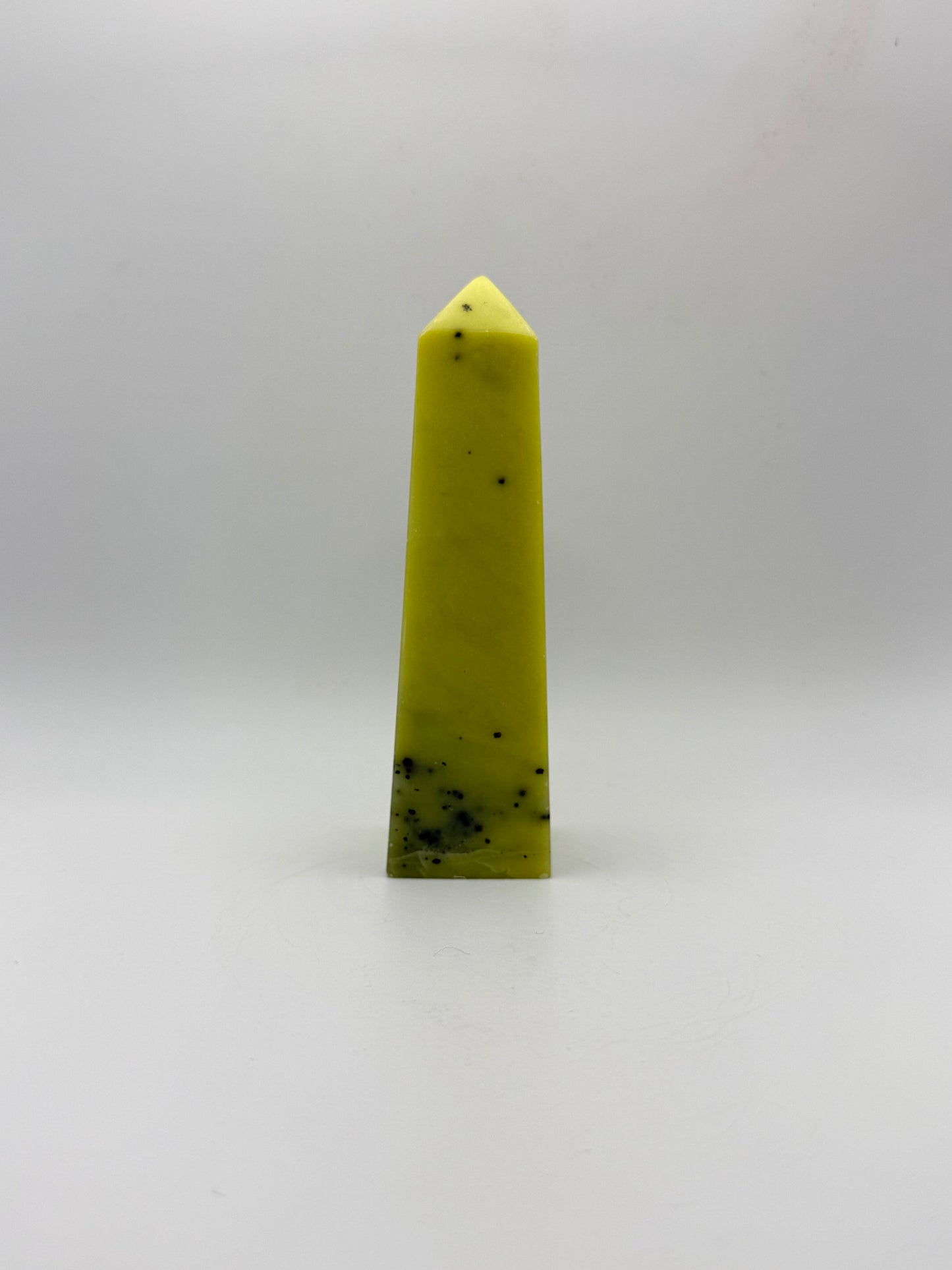 Polished healerite four sided tower.