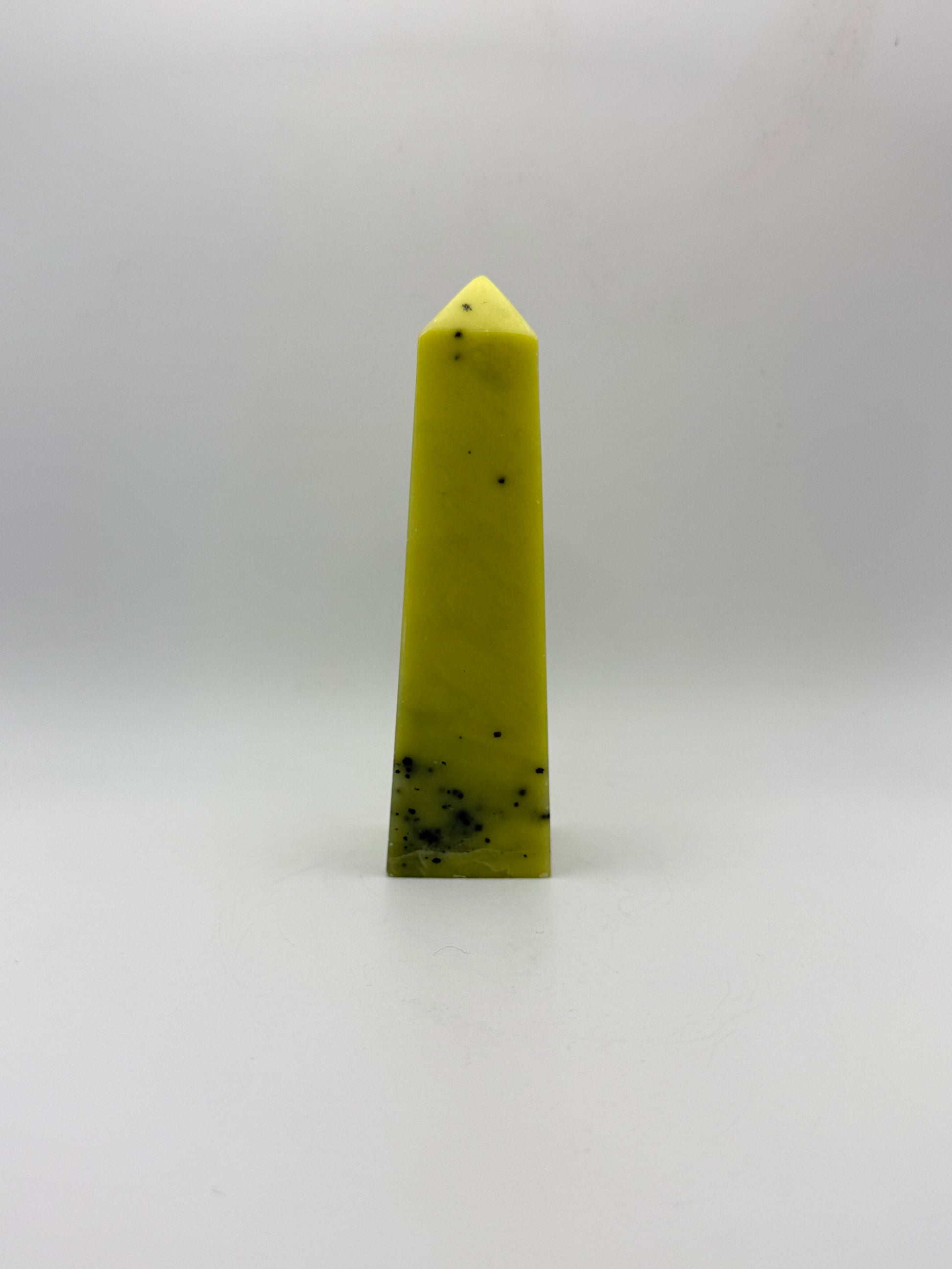 Polished healerite four sided tower.