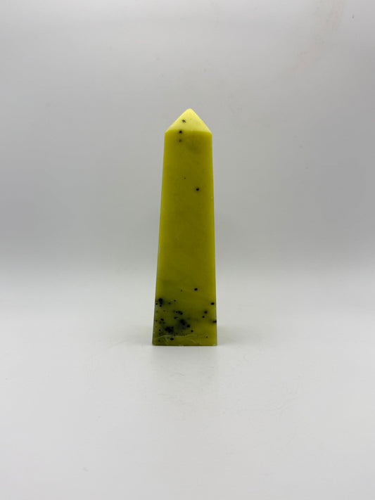 Polished healerite four sided tower.