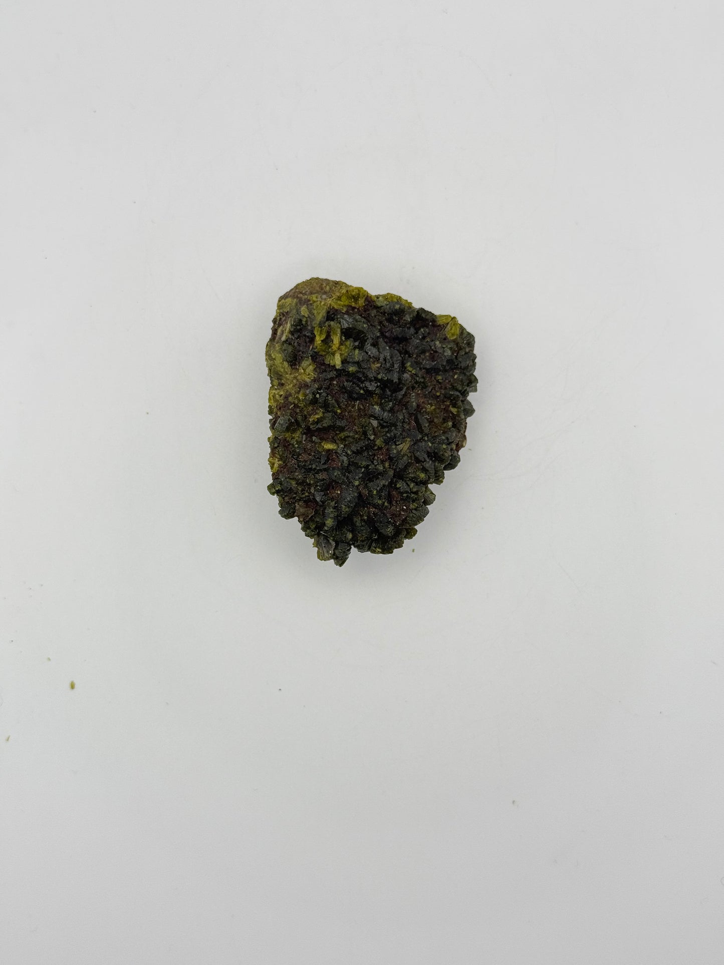 Epidote crystal cluster with good green color.