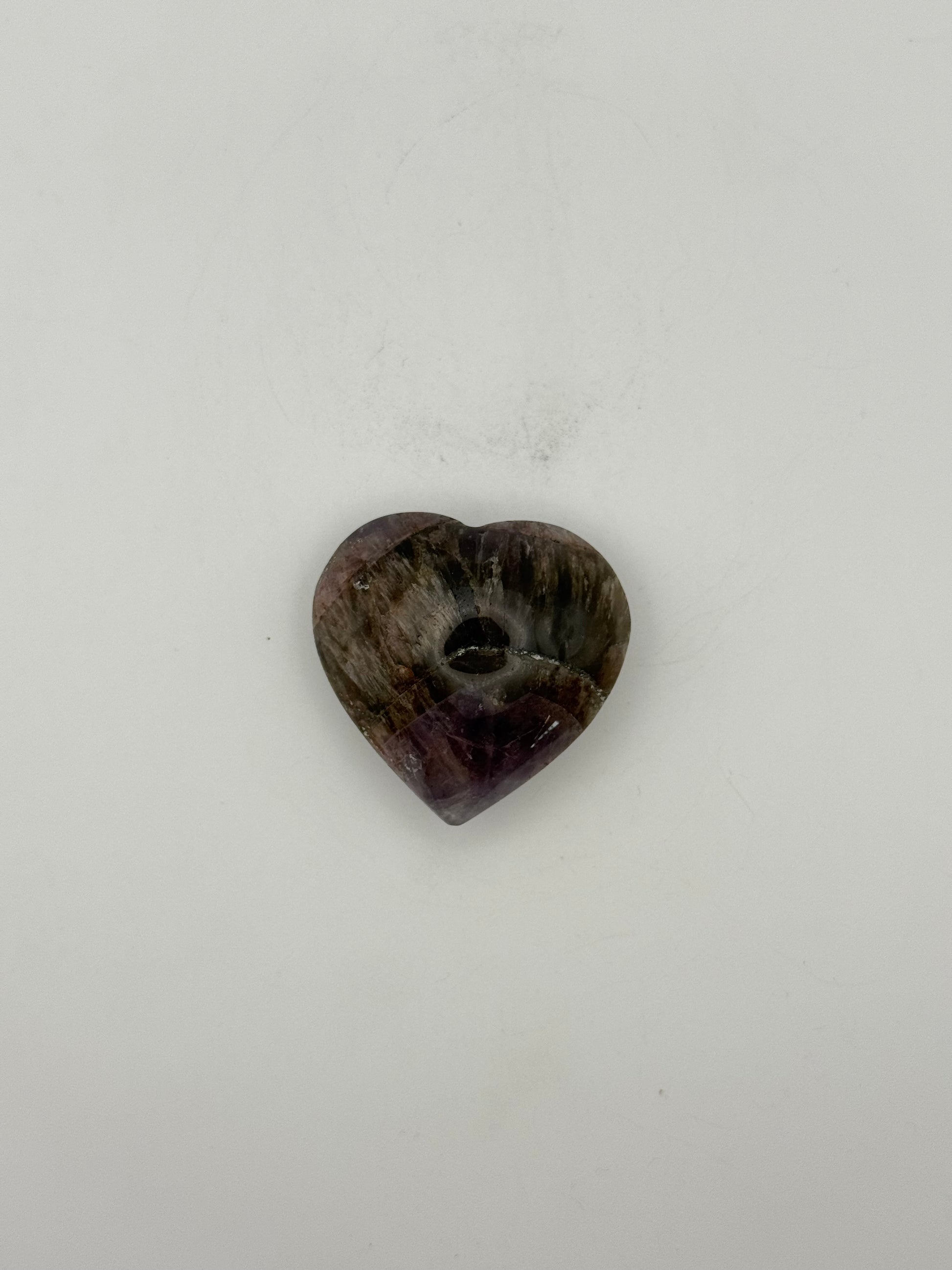 Polished super 7 in the shape of a heart.