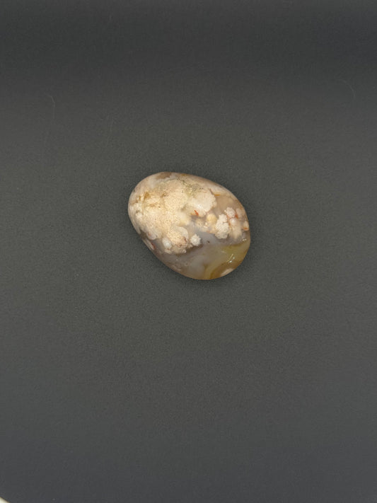 Flower agate polished crystal palm stone.