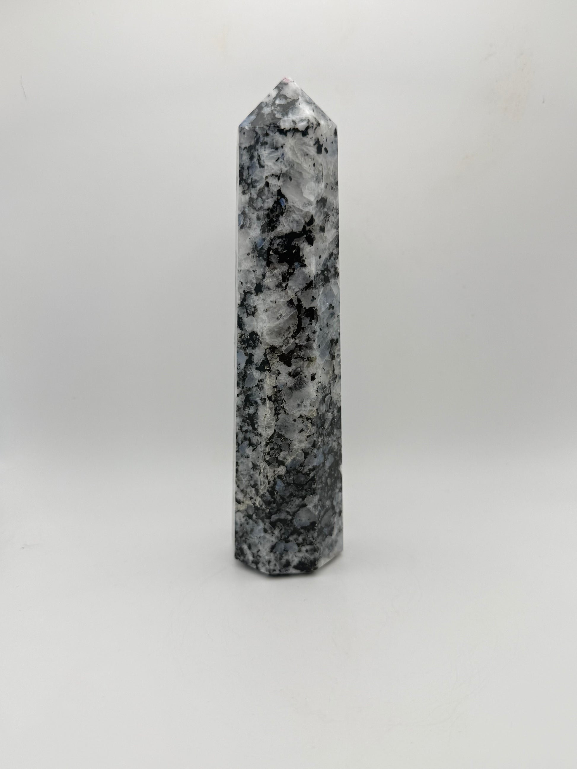 Rainbow moonstone polished tower with nice flashes of blue.