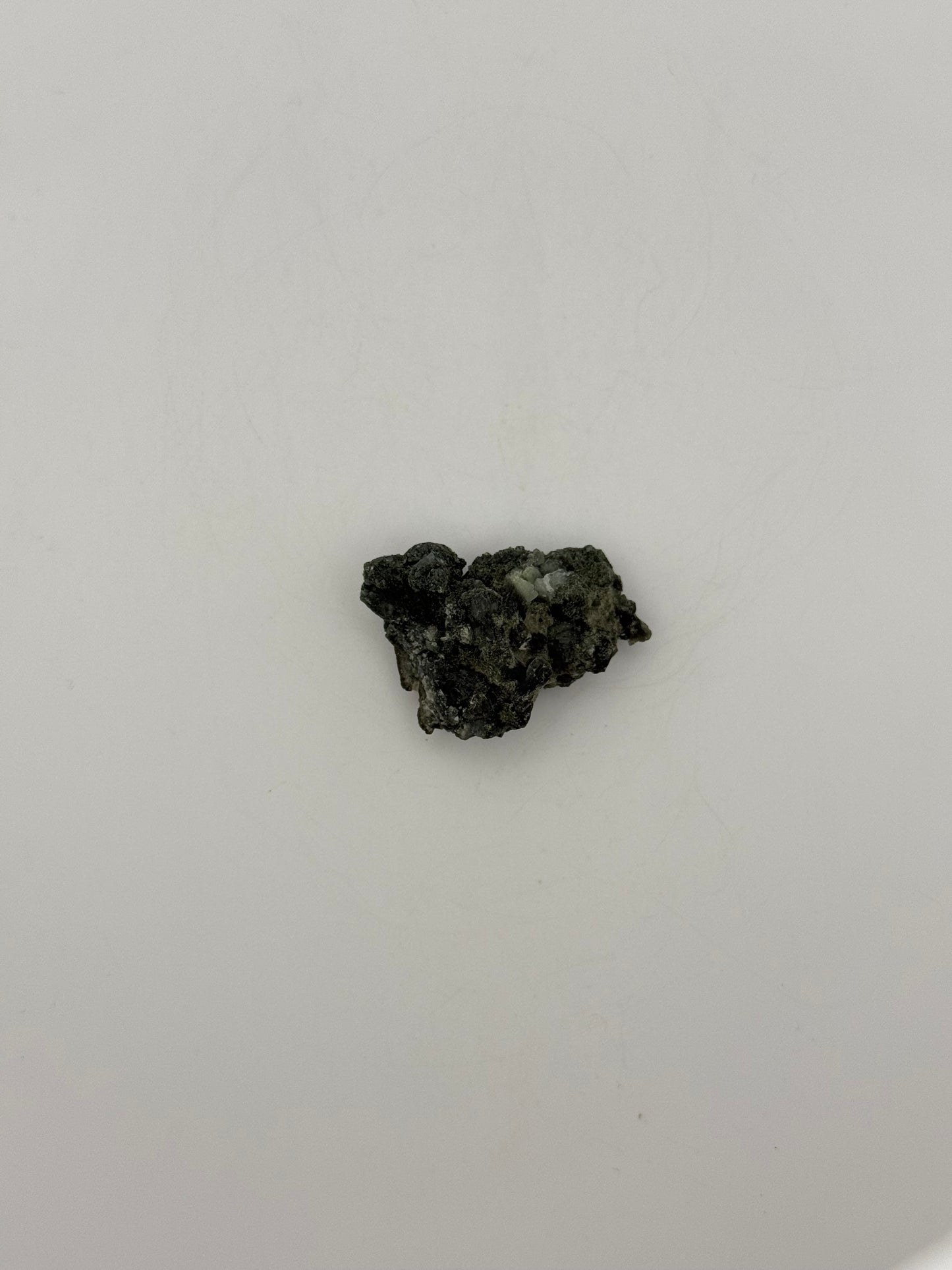 Raw prehnite specimen with amazing green color.