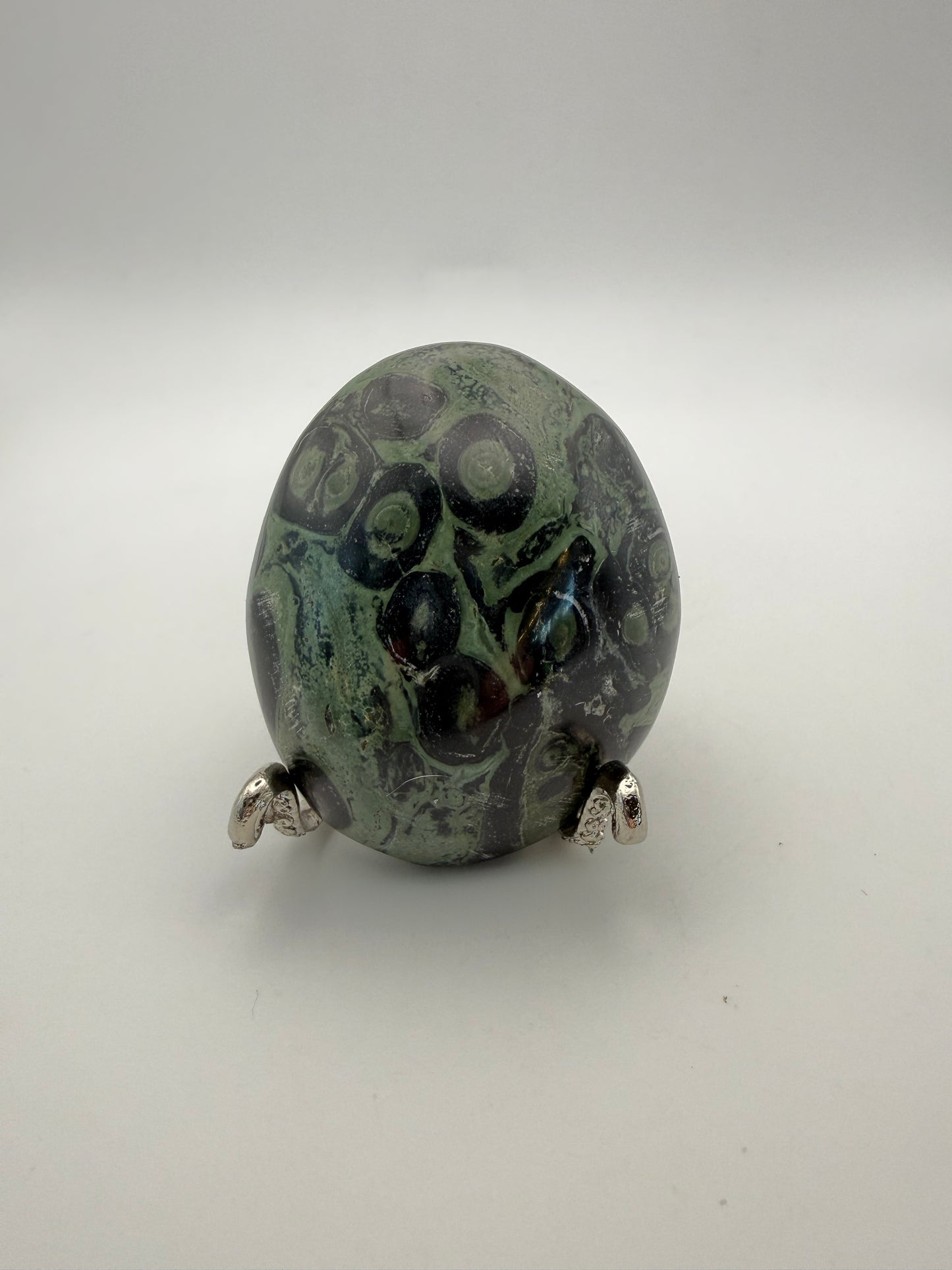 Polished kambaba jasper palm stone.
