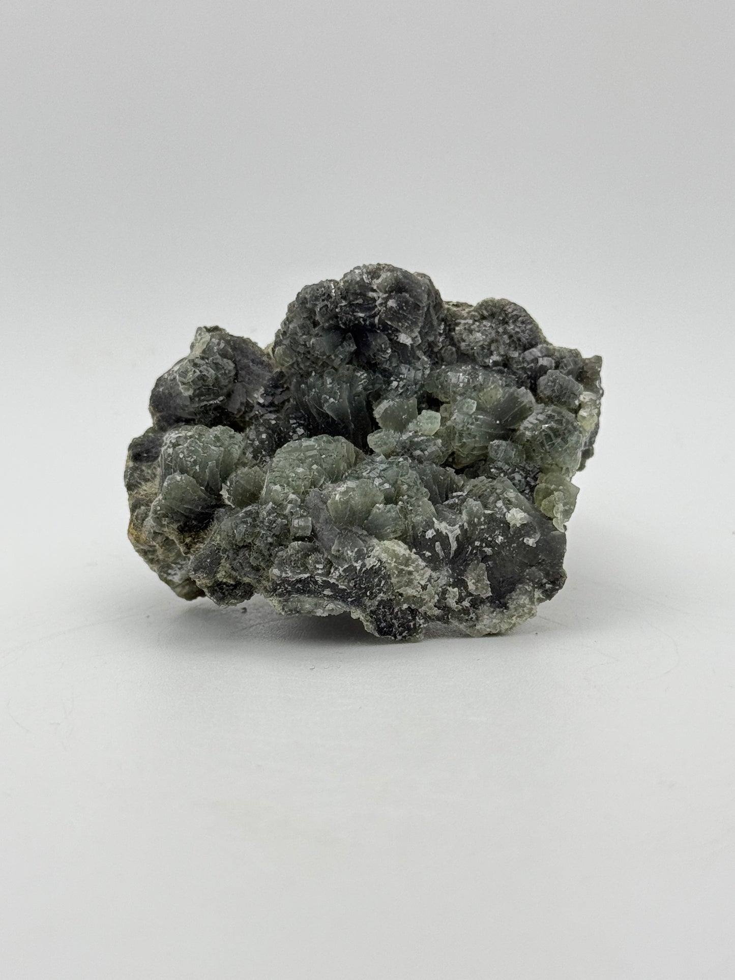 Raw prehnite specimen with amazing green color.